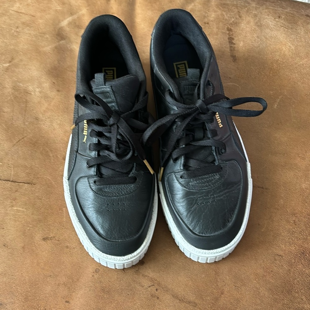 Puma black leather shoes women’s  size 11